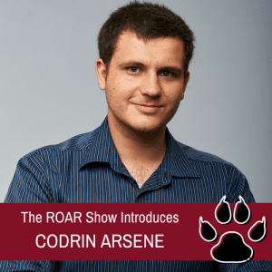 Headshot of Codrin Arsene, CEO of Digital Authority Partners featured on The Roar Show
