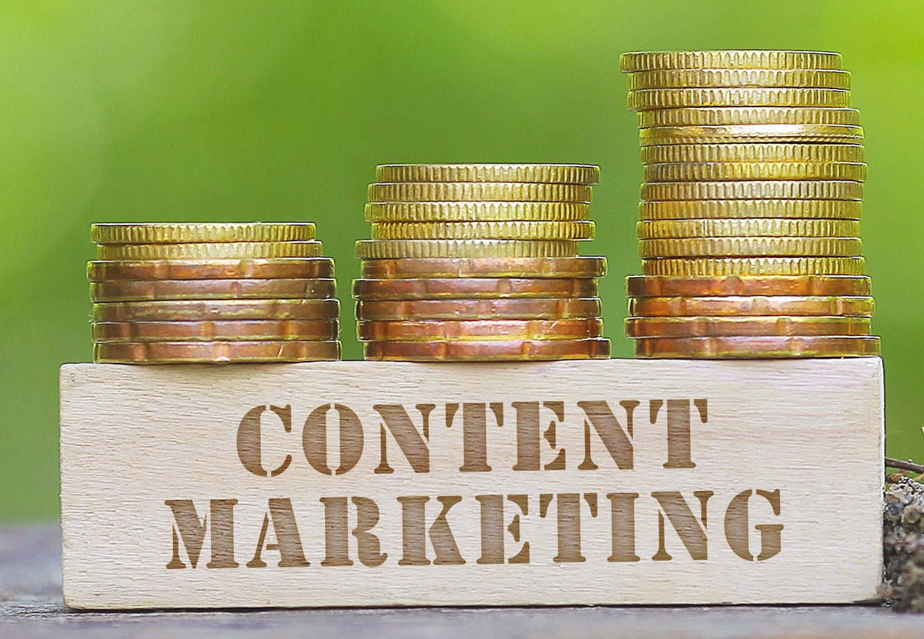 Stashes of gold coins next to a label that says Content Marketing