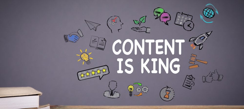 Drawing showing tool icons floating and the words "Content is king" in the middle