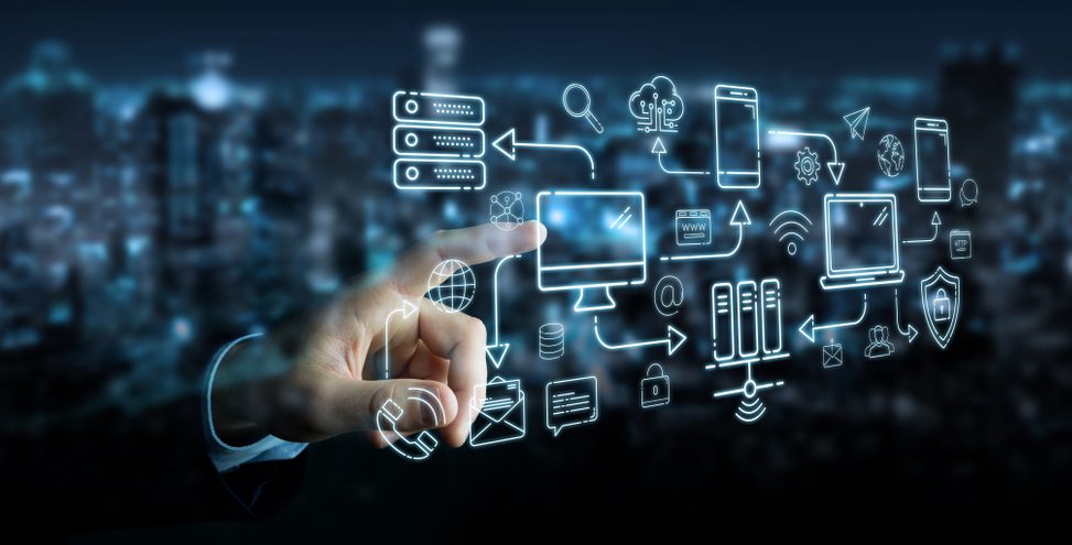 Hand interacting with a screen displaying mobile development process.