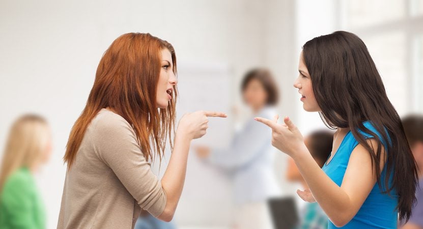 Two women having a conflict.