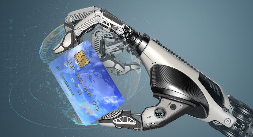 Robotic hand holding a credit card.