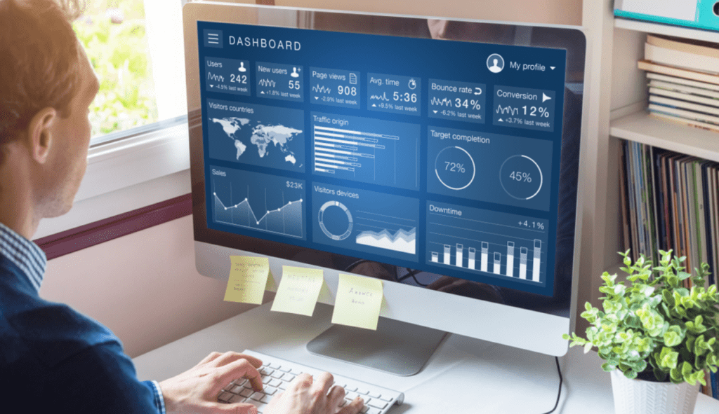 Person working at computer reviewing stats.