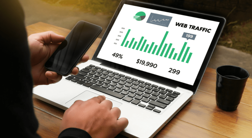 Man looking at the stats of web traffic.