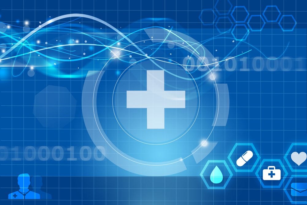 Digitalized healthcare cross symbol on a blue background