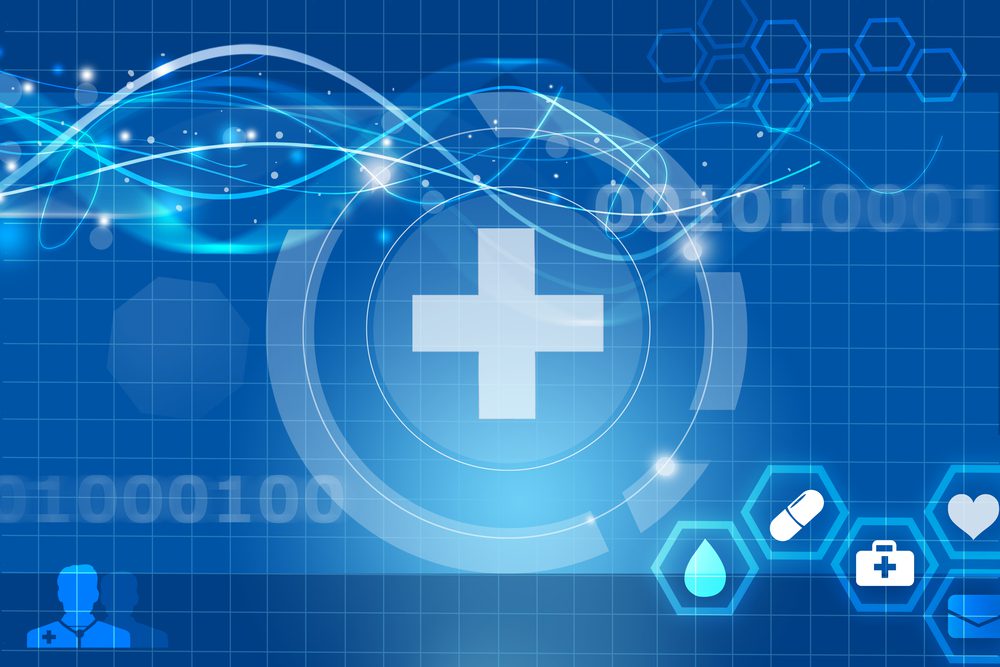 A Simple Guide to Custom Healthcare Software Development 1 Digitalized healthcare cross symbol on a blue background