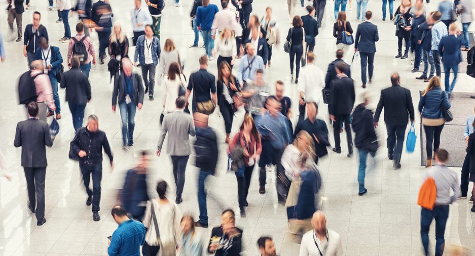 Group of people walking down the street