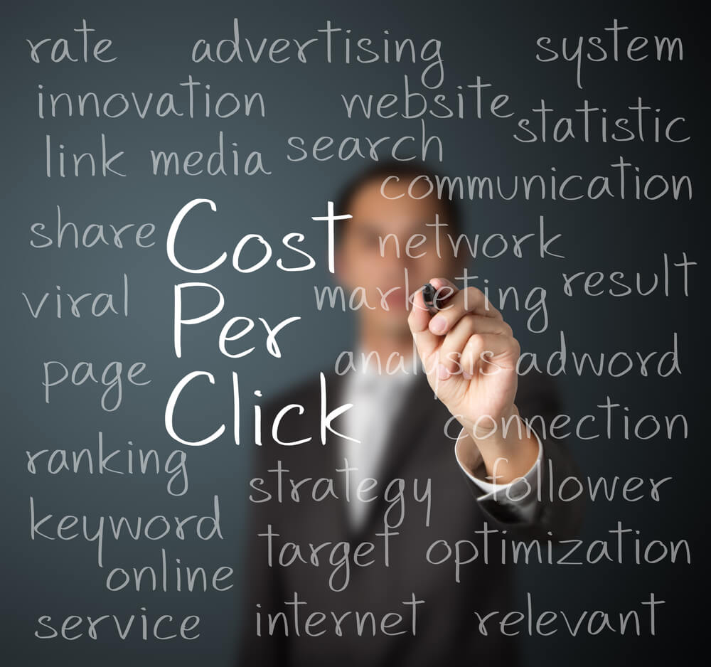 pay per click management_business man writing cost per click concept