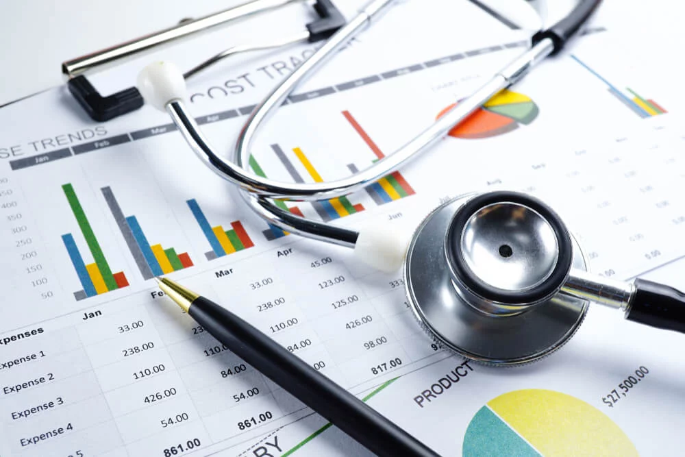 marketing for medical_Stethoscope, Charts and Graphs paper, Saving stack coins money, globe and credit card. Finance, Account, Statistics, Investment, Analytic research data economy and Business company meeting concept