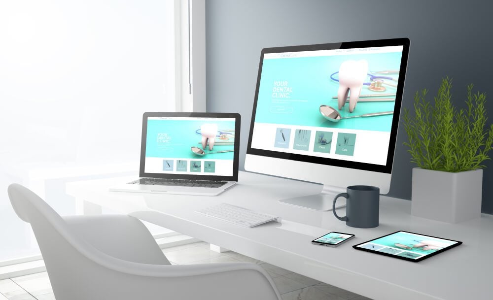dental website_3d rendering of desktop with all devices showing dental clinic website