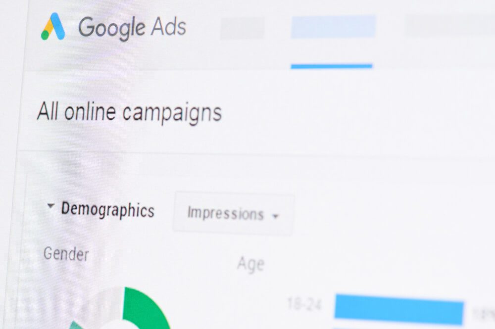 ppc campaigns_New york, USA - april 8, 2019: Google ads campaign on digital screen macro close up view