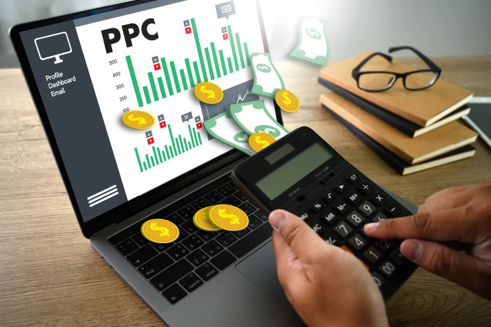 ppc roi_PPC - Pay Per Click concept Businessman working concept