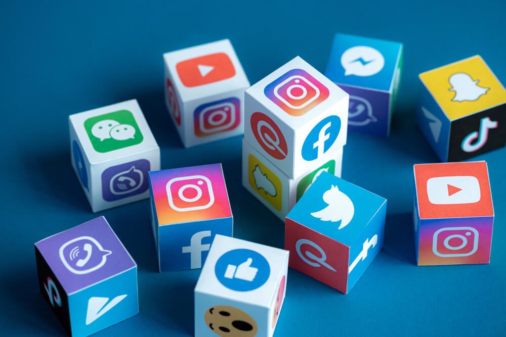 social media marketing_Kyiv, Ukraine - September 5, 2019: A paper cubes collection with printed logos of world-famous social networks and online messengers, such as Facebook, Instagram, YouTube, Telegram and others