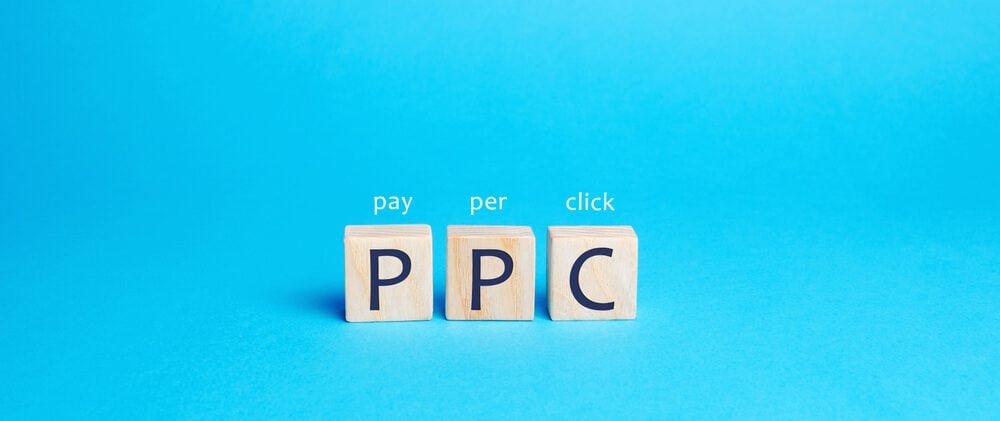 ppc_Wooden blocks with the word PPC. Internet advertising model used to drive traffic to websites. Internet marketing concept, social media marketing. Search engine optimization. Pay-per-click