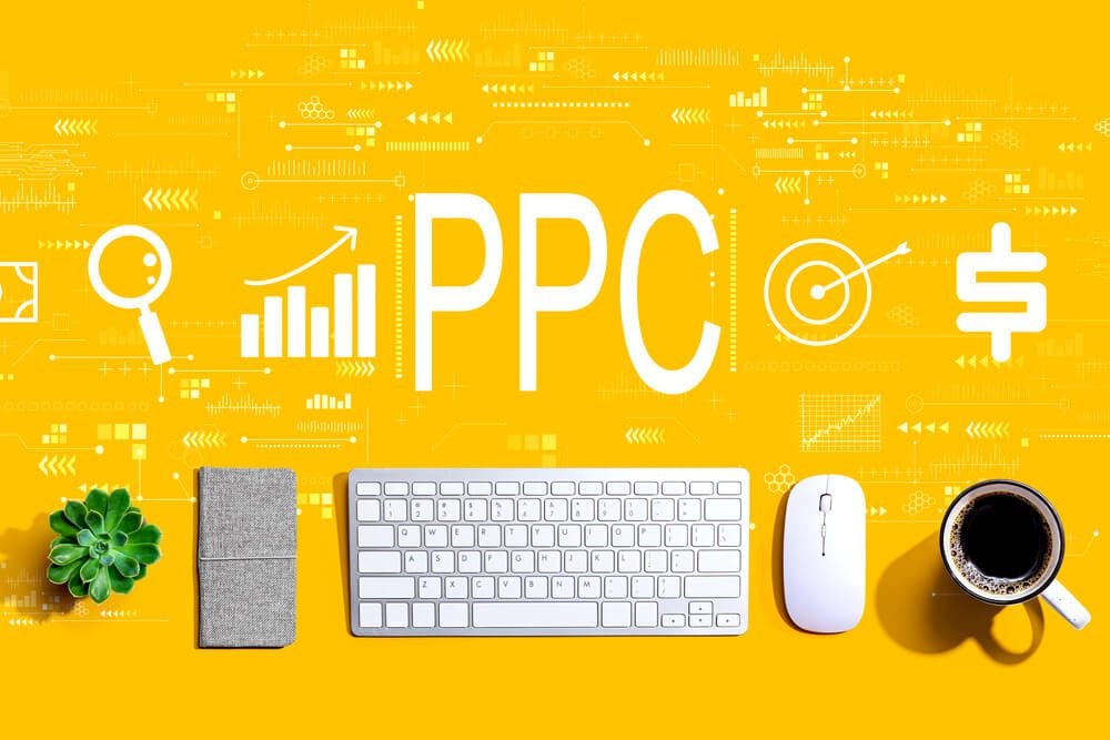ppc_PPC - Pay per click concept with a computer keyboard and a mouse