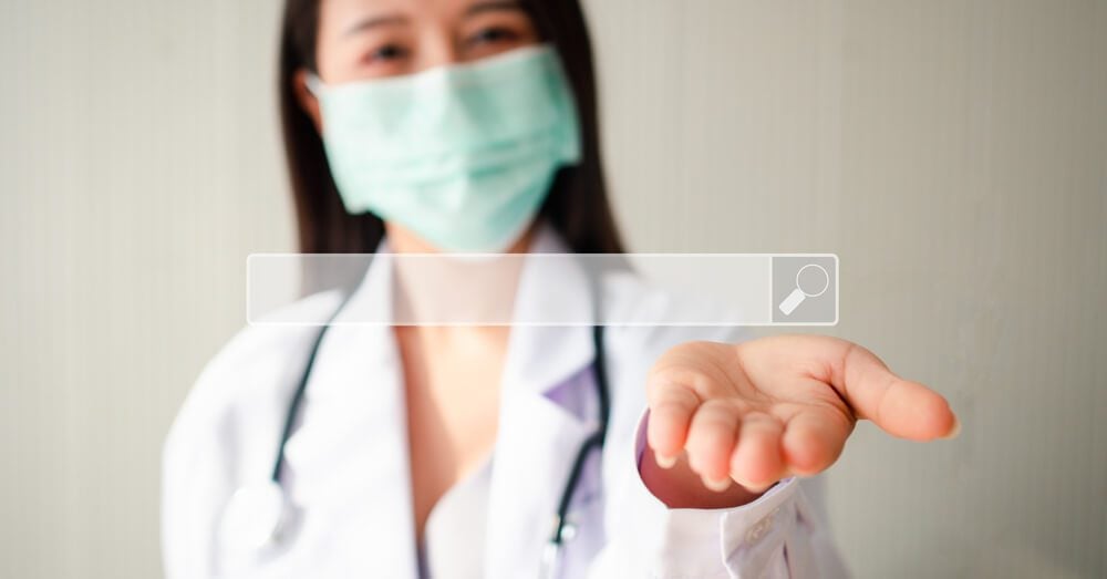 medical seo_Asian woman doctor open the palm of the hand and on hand have searching browsing internet bar, Concept of Searching Browsing Internet Data Information Networking for medical and healthcare