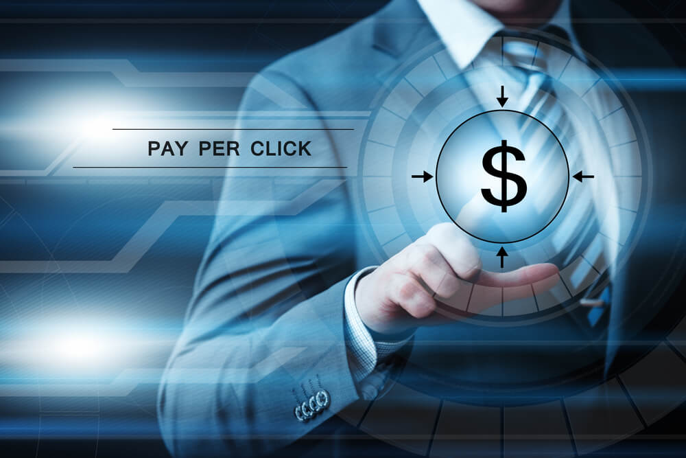 pay per click management_business, technology and internet concept - businessman pressing button on virtual screens