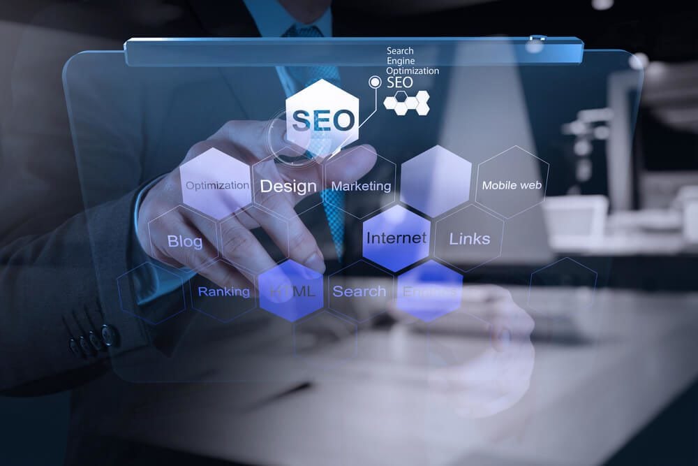 search engine optimization_double exposure of businessman hand showing search engine optimization SEO as concept