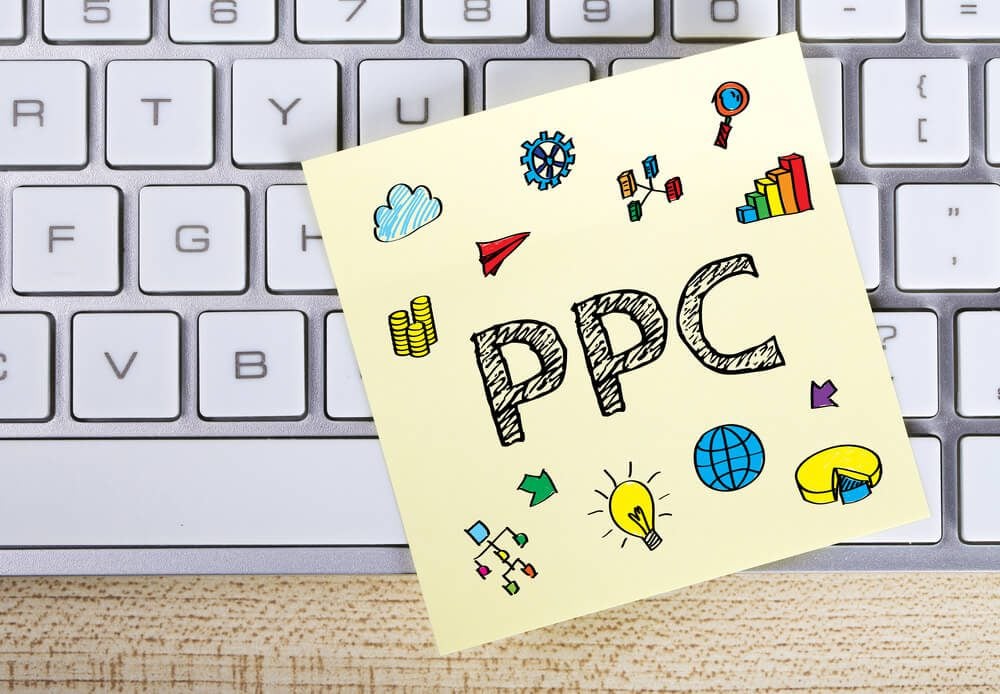 ppc_PPC business concept on the sticky note pasted on the keyboard