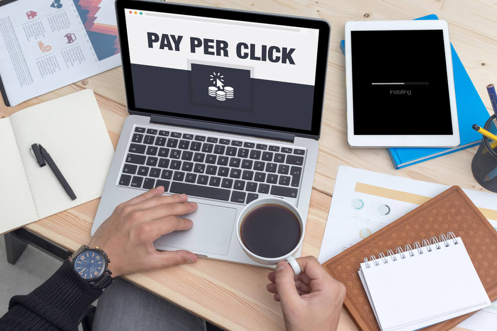 ppc consulting_Pay Per Click Icon Concept on Laptop Screen