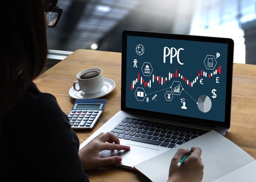 ppc marketing_PPC - Pay Per Click concept Businessman working concept