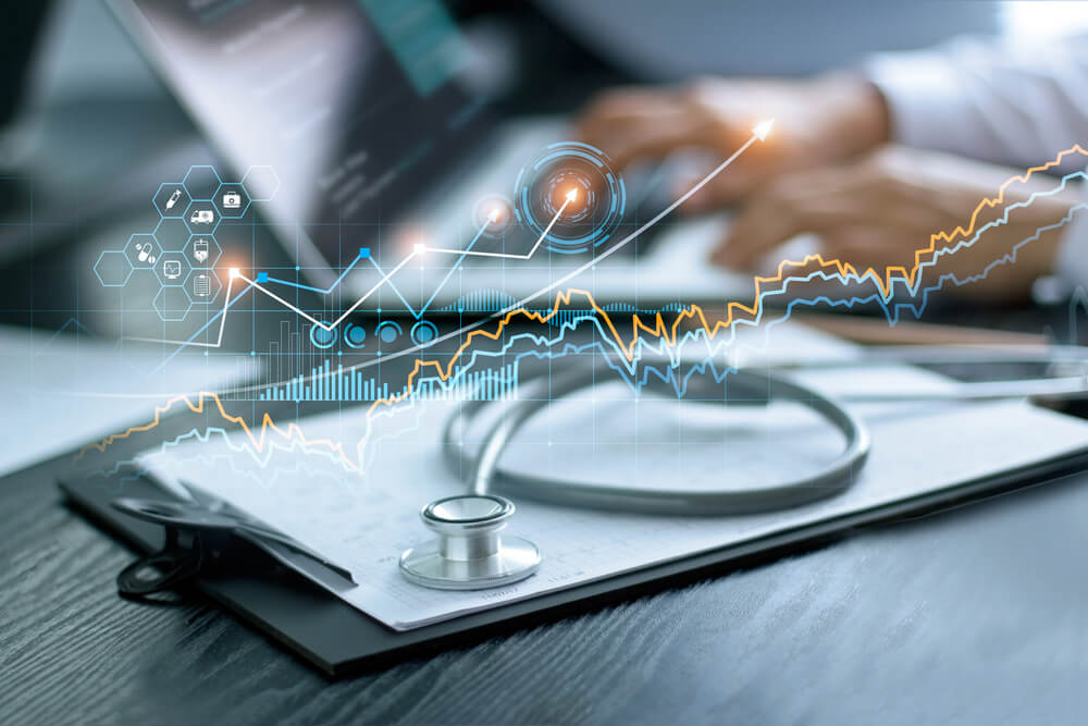 medical digital marketing_Healthcare business graph data and growth, Stethoscope with doctor's health report clipboard on table, Medical examination and doctor analyzing medical report on laptop screen.