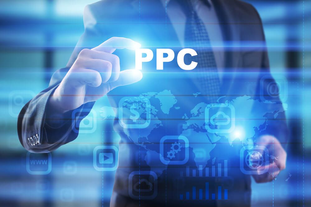 ppc marketing_Businessman selecting ppc on virtual screen.