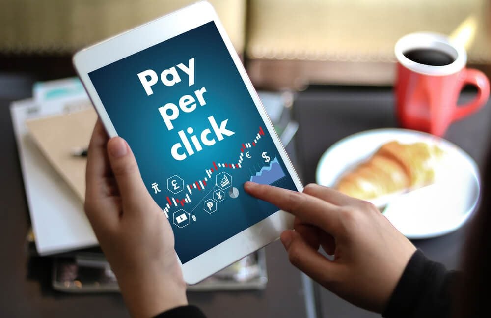 ppc marketing_PPC - Pay Per Click concept Businessman working concept