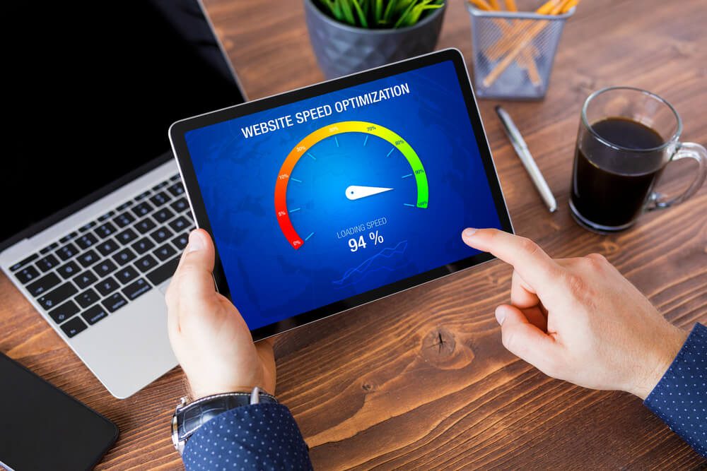 Hiring a Technical SEO Partner? 15 Pointed Questions To Ask 2 page speed test_Man evaluating website loading speed, concept of page speed optimization