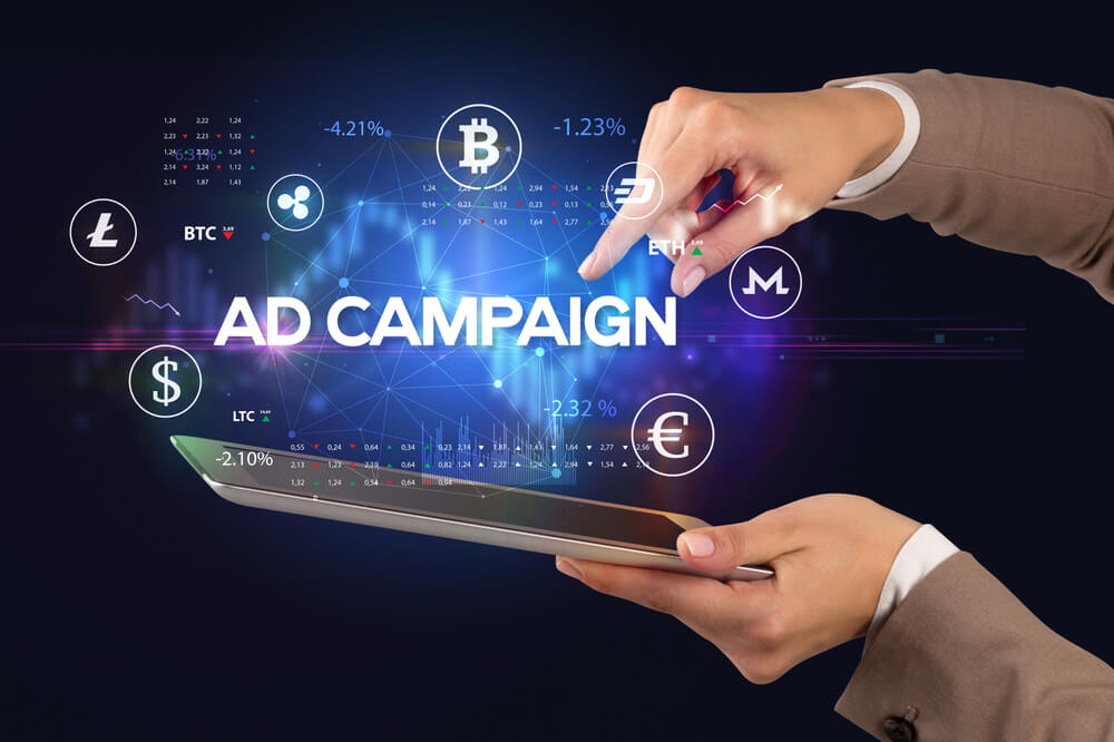 ad campaign_Close-up of a touchscreen with AD CAMPAIGN inscription, business opportunity concept