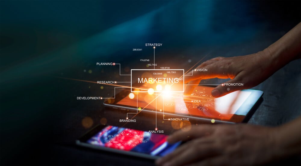 marketing_Digital marketing network connection concept. Businessman hand working on digital tablet with graphical user interface icons on strategy, solution analysis and development contents.