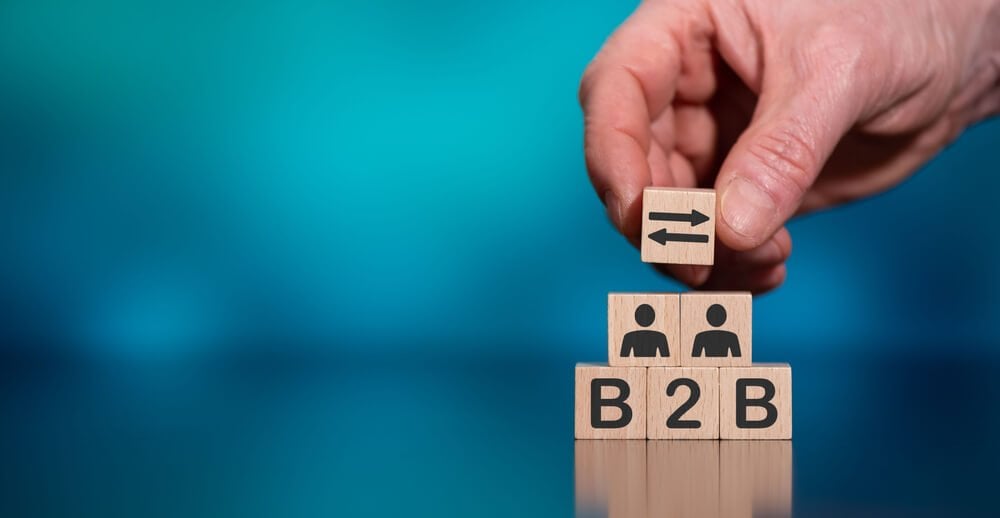 b2b marketing_Concept of B2B with icons on wooden cubes