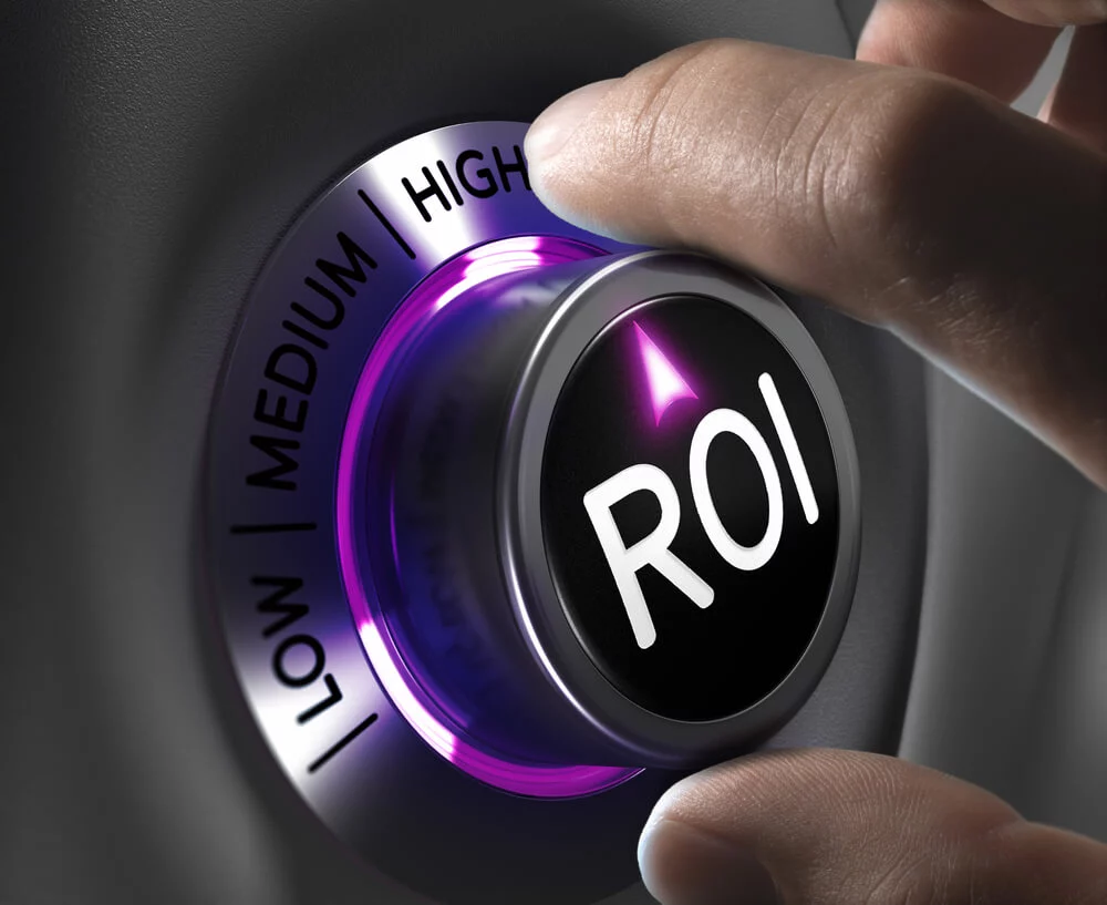 highest roi_Return on Investment, ROI Concept, two fingers turning button in the highest position. Conceptual image