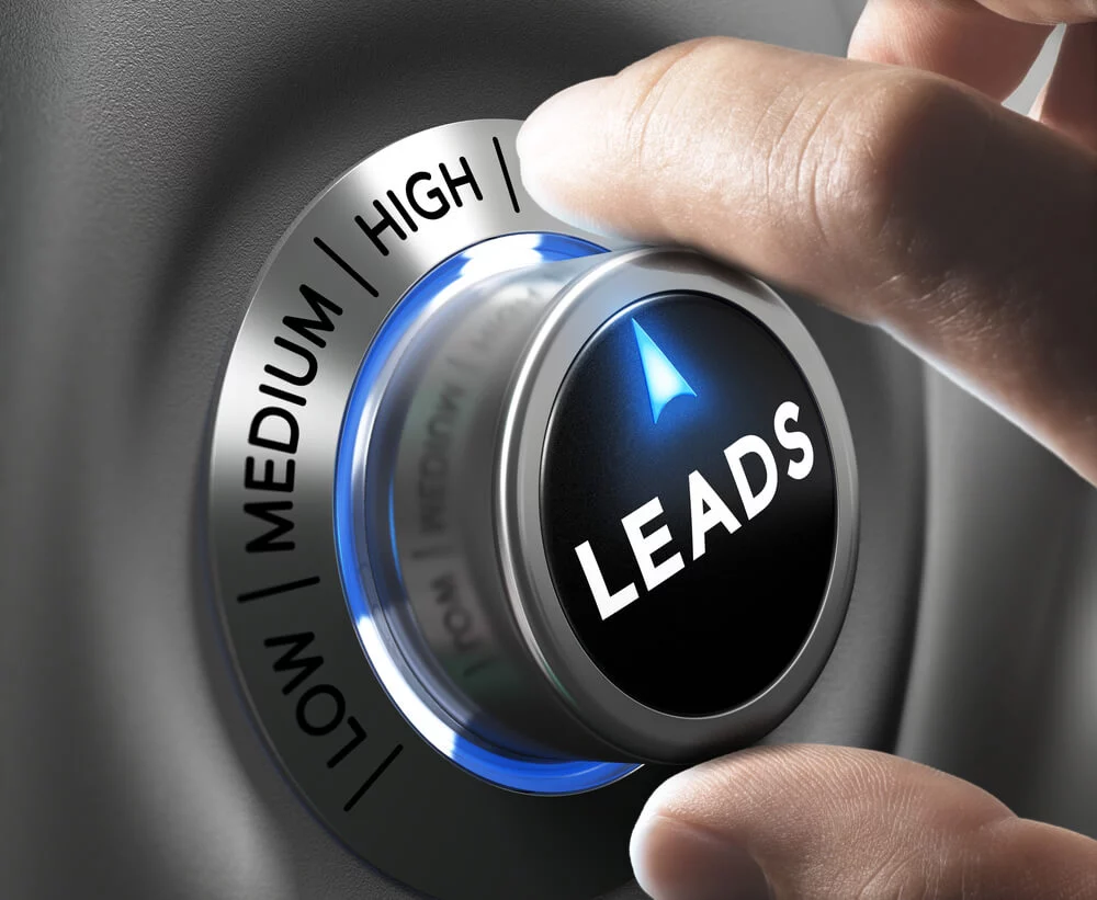 leads_Leads button pointing high position with two fingers, blue and grey tones, Conceptual image for increasing sales lead.
