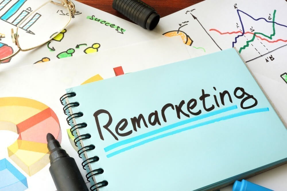 remarketing_Remarketing written on a notepad sheet. Marketing concept.