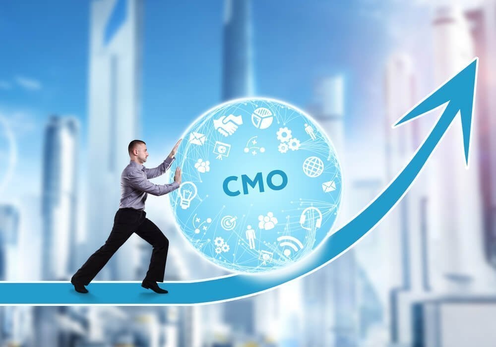 CMO_Technology, the Internet, business and network concept. A young businessman overcomes an obstacle to success: CMO