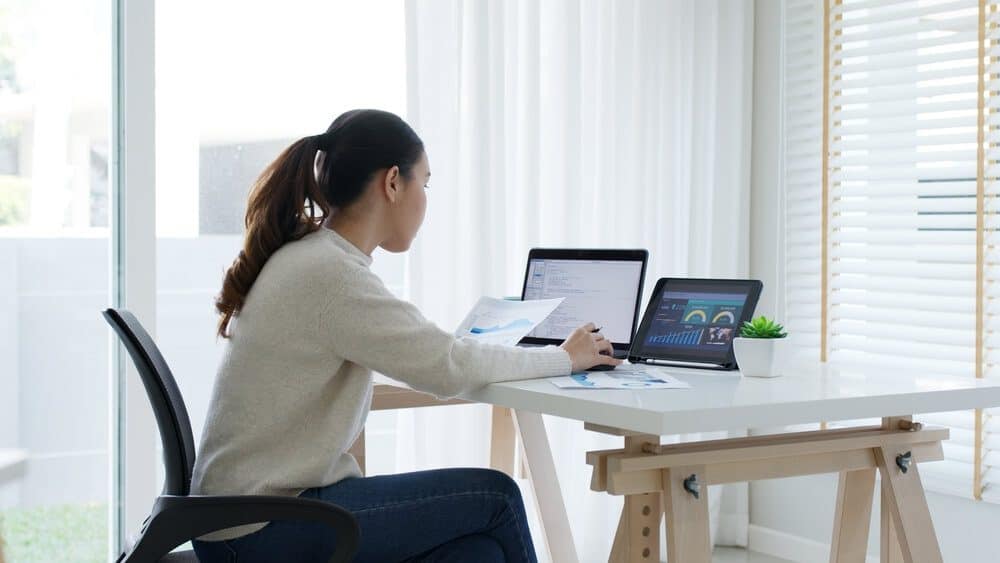 data and seo_Back rear view of young asian woman, freelance data scientist work remotely at home coding programing on Big data mining, AI data engineering, IT Technician Works on Artificial Intelligence Project.