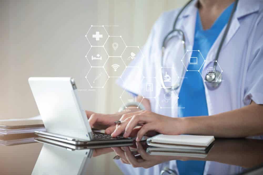 healthcare marketing_Healthcare And Medicine. Doctor using a digital tablet.