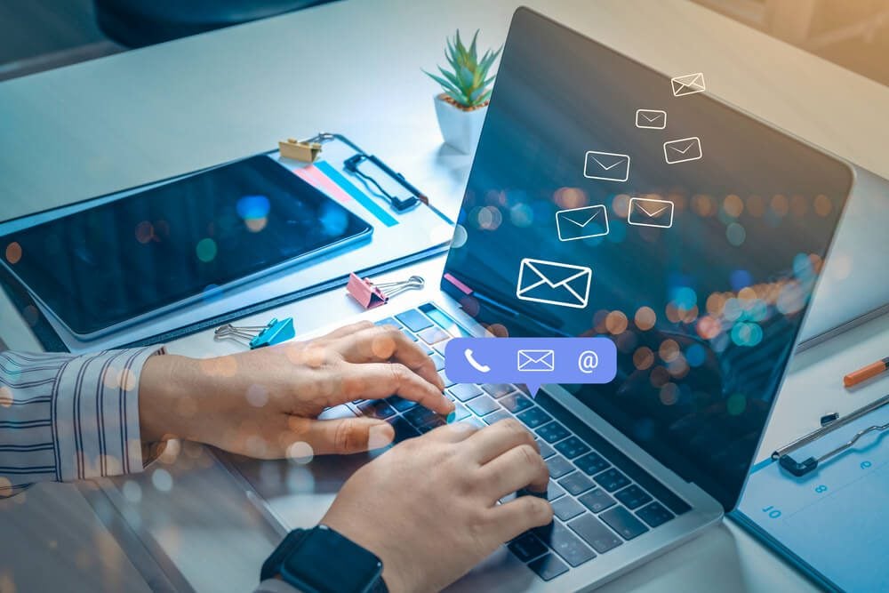 email marketing_Contact us or Customer support hotline people connect. Businessman using a mobile phone with the (email, call phone, mail) icons.