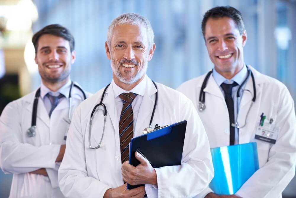 medical content_Your everyday super heroes. A medical team standing in the hospital corridor.