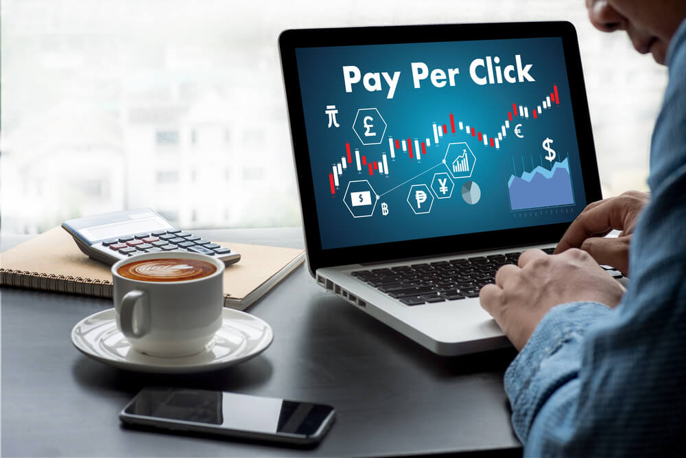 pay per click_PPC - Pay Per Click concept Businessman working concept