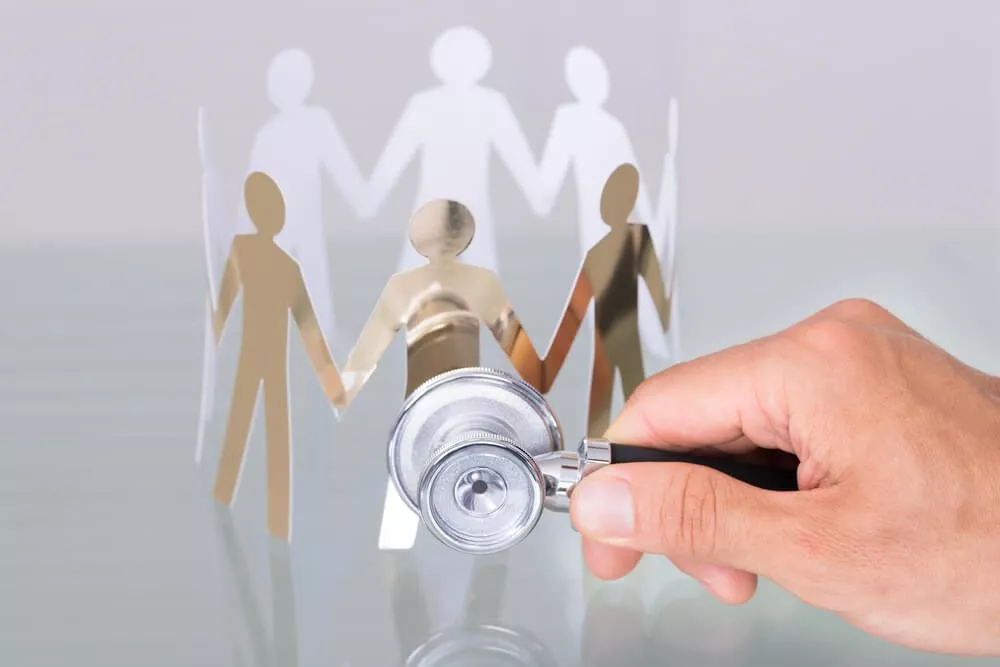 local healthcare_Checking paper cut people using stethoscope in healthcare concept