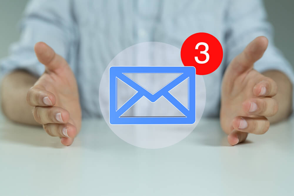 healthcare email_Hand with an email icon 3d