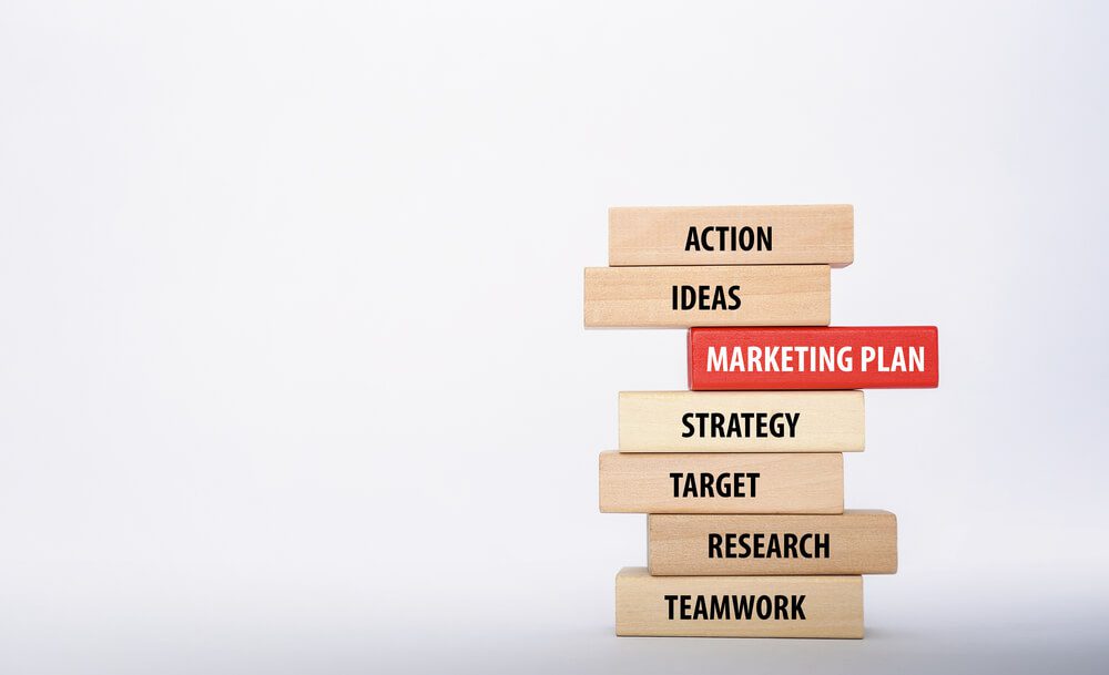 marketing_MARKETING PLAN concept with Wooden Blocks