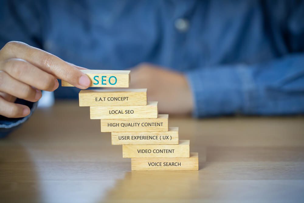 seo ranking_Text " SEO " on wooden block. concept for promoting website traffic, ranking, optimizing your website to rank in search engines or SEO.