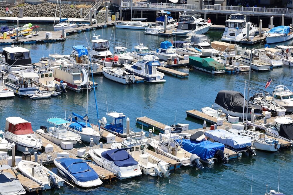 san diego boat rental_San Diego, CA USA - July 9, 2022: View of the SeaWorld Marina from the Bayside Skyride gondolas at SeaWorld San Diego.