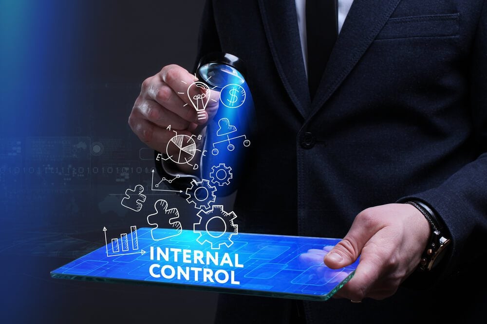 internal search_Business, Technology, Internet and network concept. Young businessman working on a virtual screen of the future and sees the inscription: Internal control