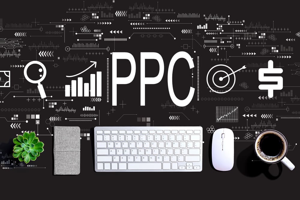 ppc_PPC - Pay per click concept with a computer keyboard and a mouse