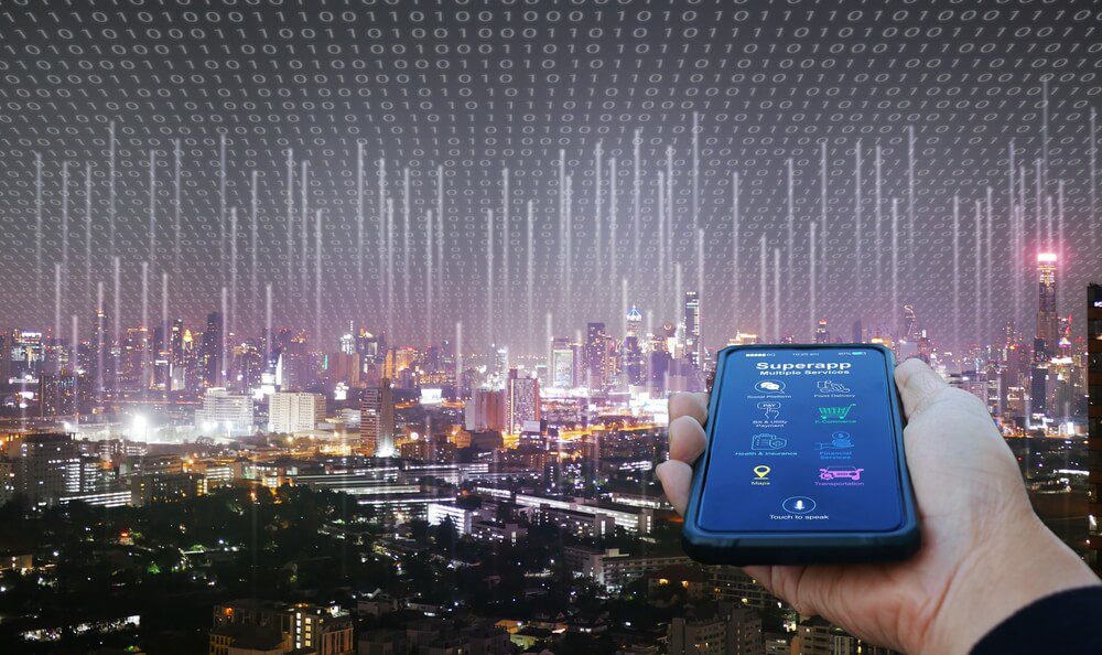 mobile app_Hand holds a smartphone with a super app that serves multiple services as a one-stop service with an active network in the background.