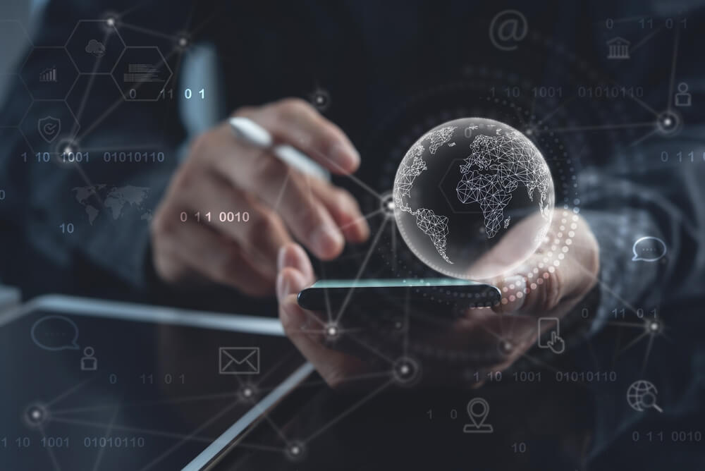 How To Optimize Your Mobile App for the Best SEO Ranking 1 mobile app_Global internet network connection technology, IoT, Internet of Things concept. Business man using mobile phone with global network and technology icons on virtual screen, remotely work